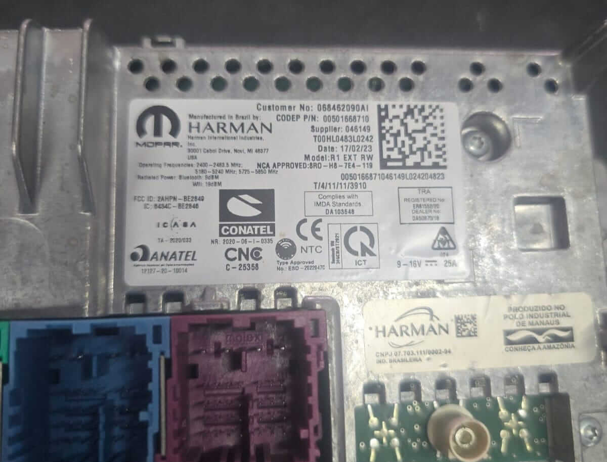 Harman Uconnect T00HL serial number label with the part number barcode